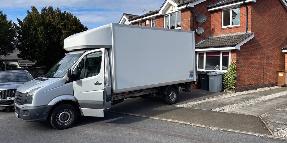 Green4Logistics removal van on a house removal in Congleton town centre, Cheshire