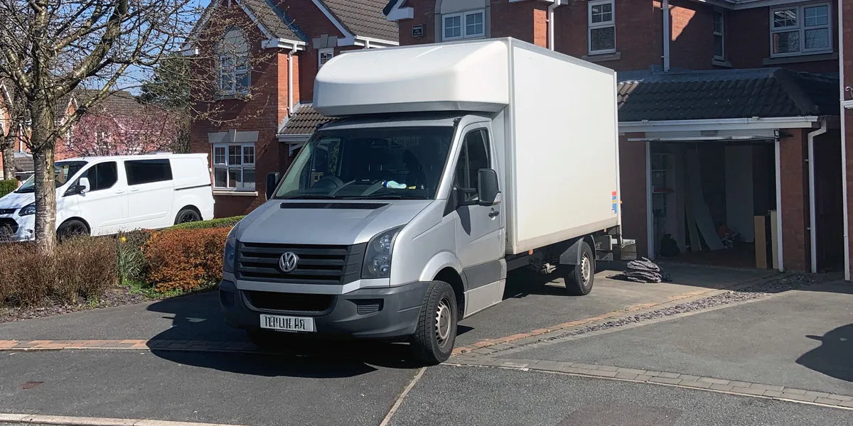 Green4Logistics removal van on a house removal in Crewe town centre, Cheshire